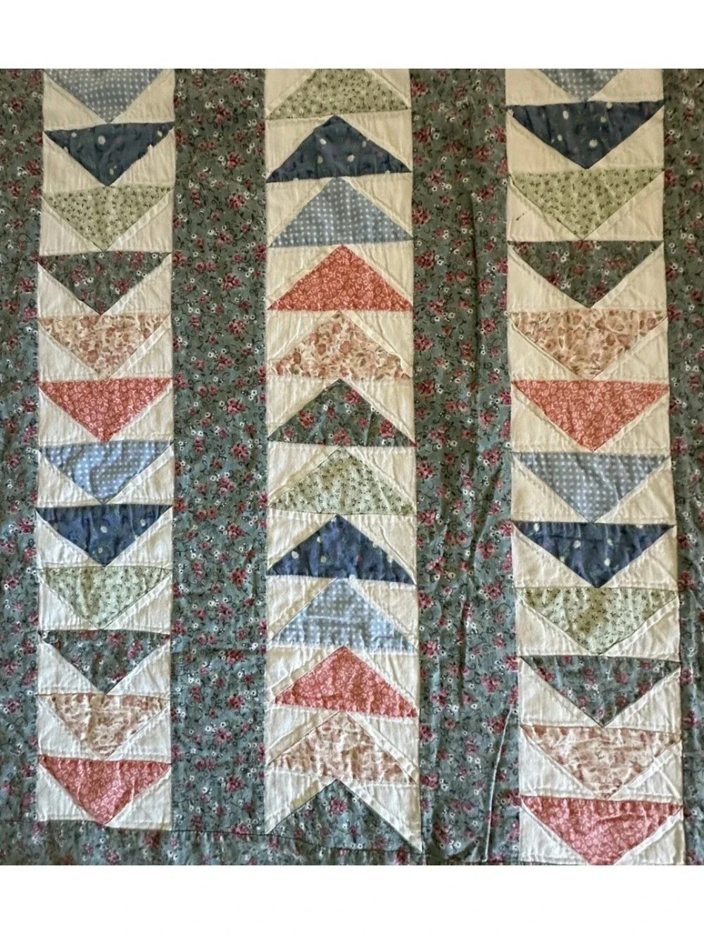 Vintage handmade flying geese quilt